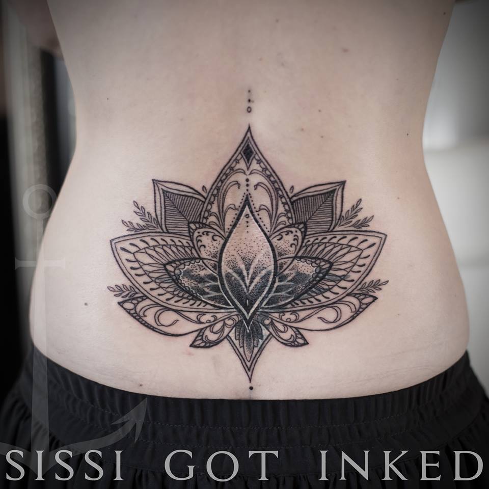 mandala lotus waist tattoo