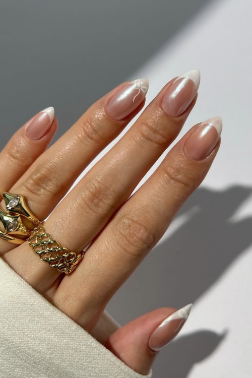 30 Creative Nail Art Ideas: Unlock Stunning DIY Designs at Home! 12 minimal white chrome tips with a dainty bow detail