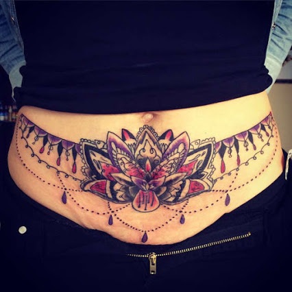 stomach lotus flower tattoos