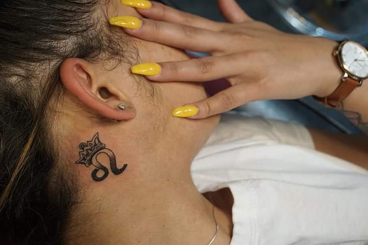 Artistic Tiny Crown Ear Tattoo