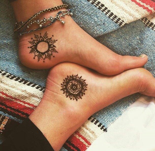 Attractive Bohemian Henna Sun Tattoo Design for Ankle