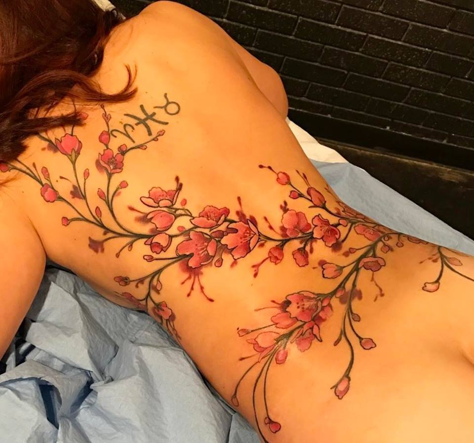 Beautiful Female Full Back Tattoo Design with Flowers