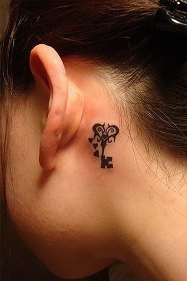 Beautifully Detailed Key Tattoo Placed Behind the Ear