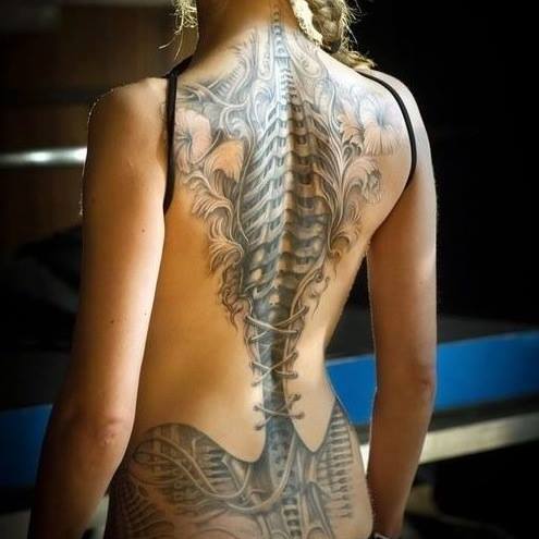 Bold and Beautiful Women Spine Tattoo