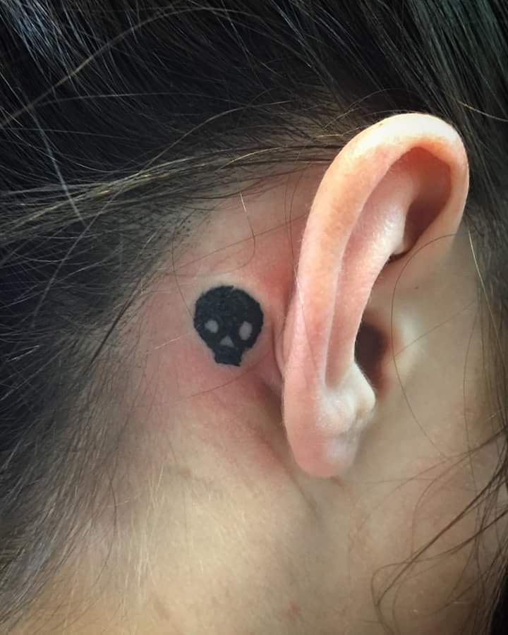 Cool Skull Tattoo Placed Behind the Ear