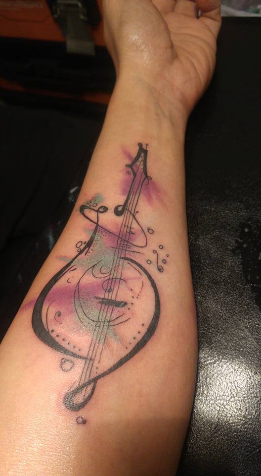 Cool Watercolor Abstract Guitar Tattoo on Wrist