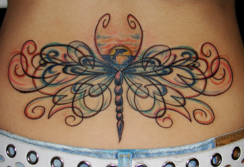 Dashing Dragonfly Lower Back Tattoo Idea for Women