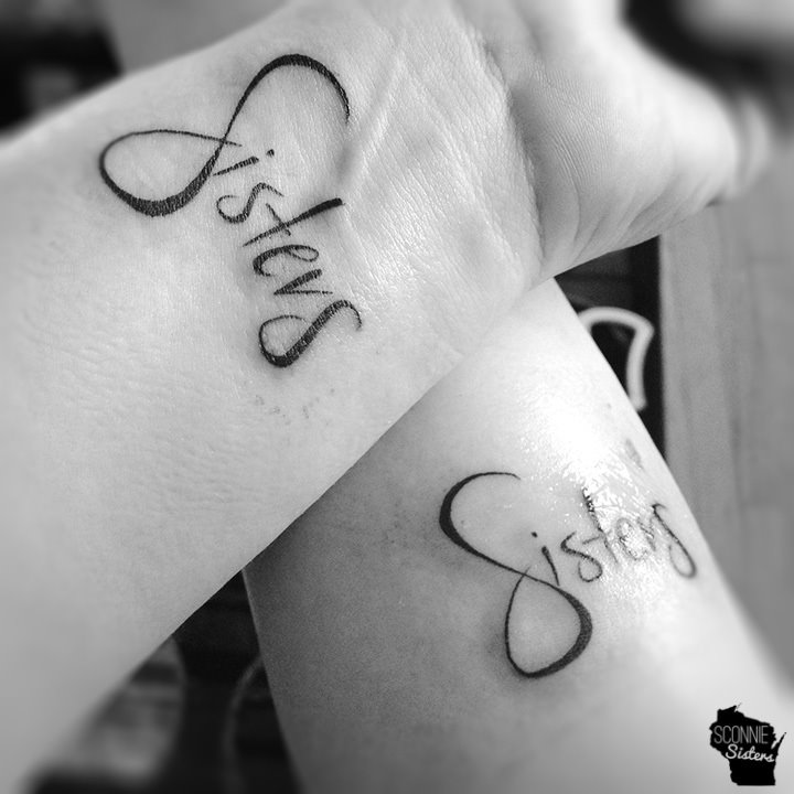 Distinctive Sisters Matching Tattoos with subtle infinity symbol design