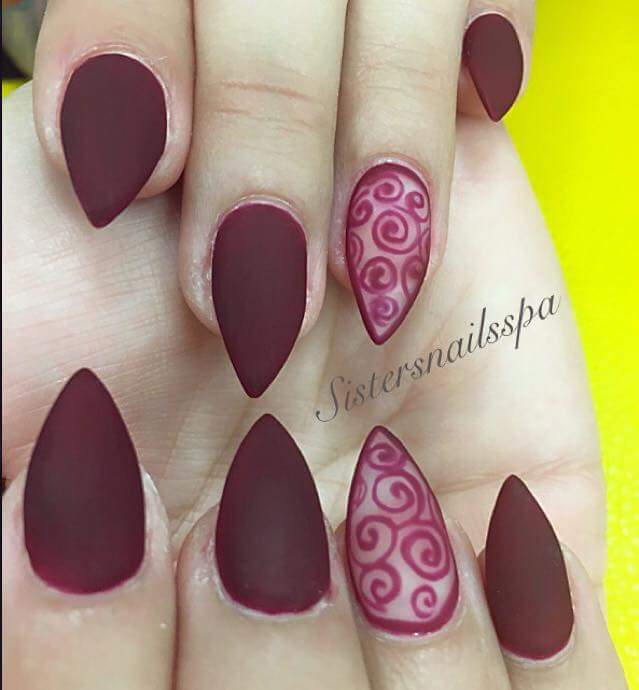 Enchanting Pointed Matte Nail Art with Spiral Design