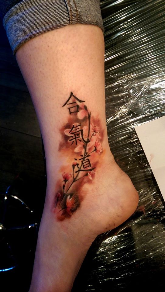 Impressive Ankle watercolor tattoo Design