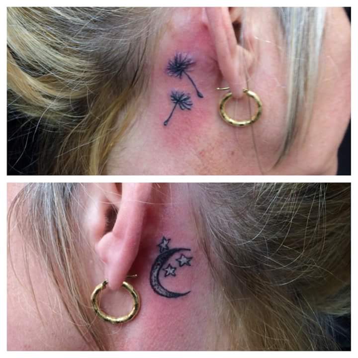 Moon and Stars Tattoo Behind 1 Ear with Floating Dandelion Tattoo Behind Another Ear