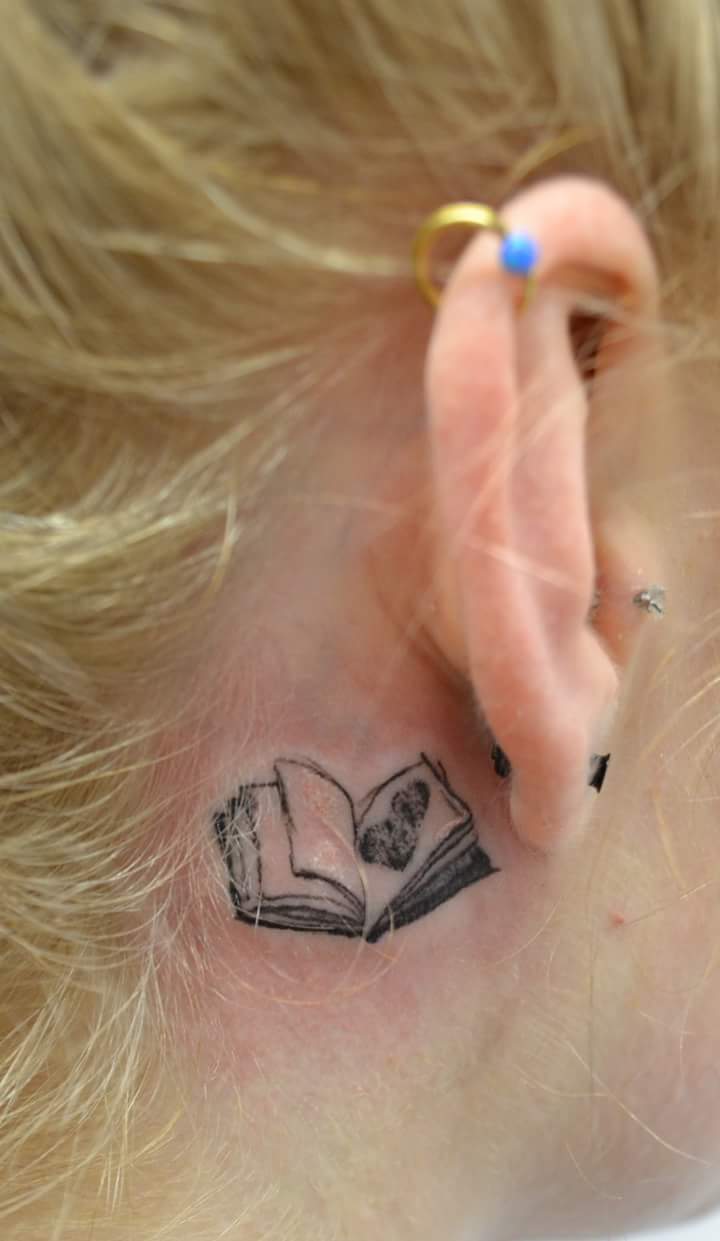 Open Book Tiny Ear Tattoo Idea