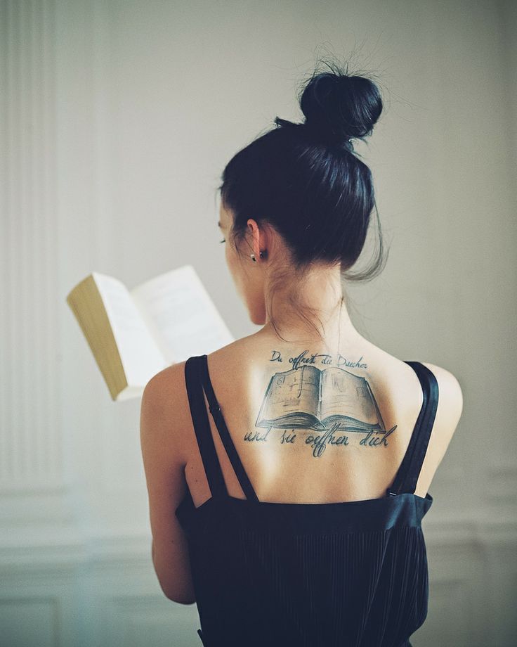 Outstanding Women Back Book Tattoo