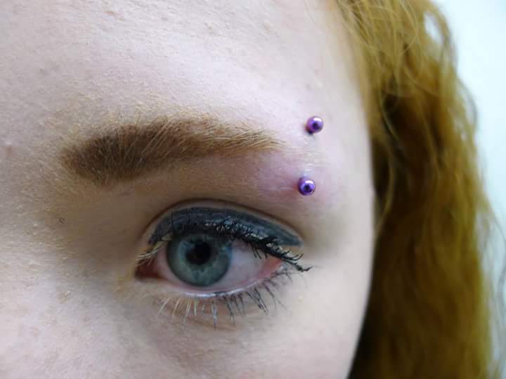 Purple Circle Arrow Piercing Brow