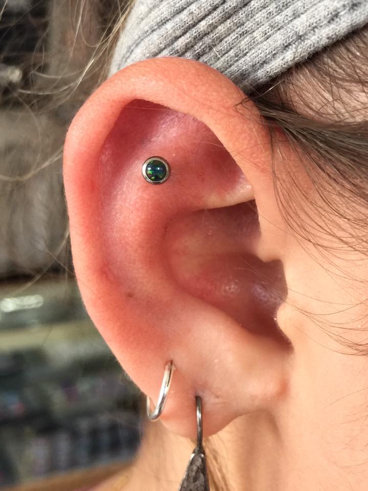 Titanium Labret with Black Opal Head in Upper Ear Piercing