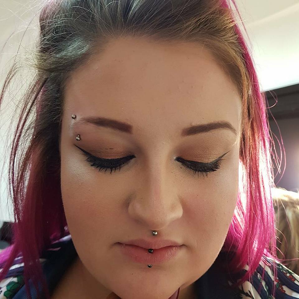 Various Lip and Eye Piercings