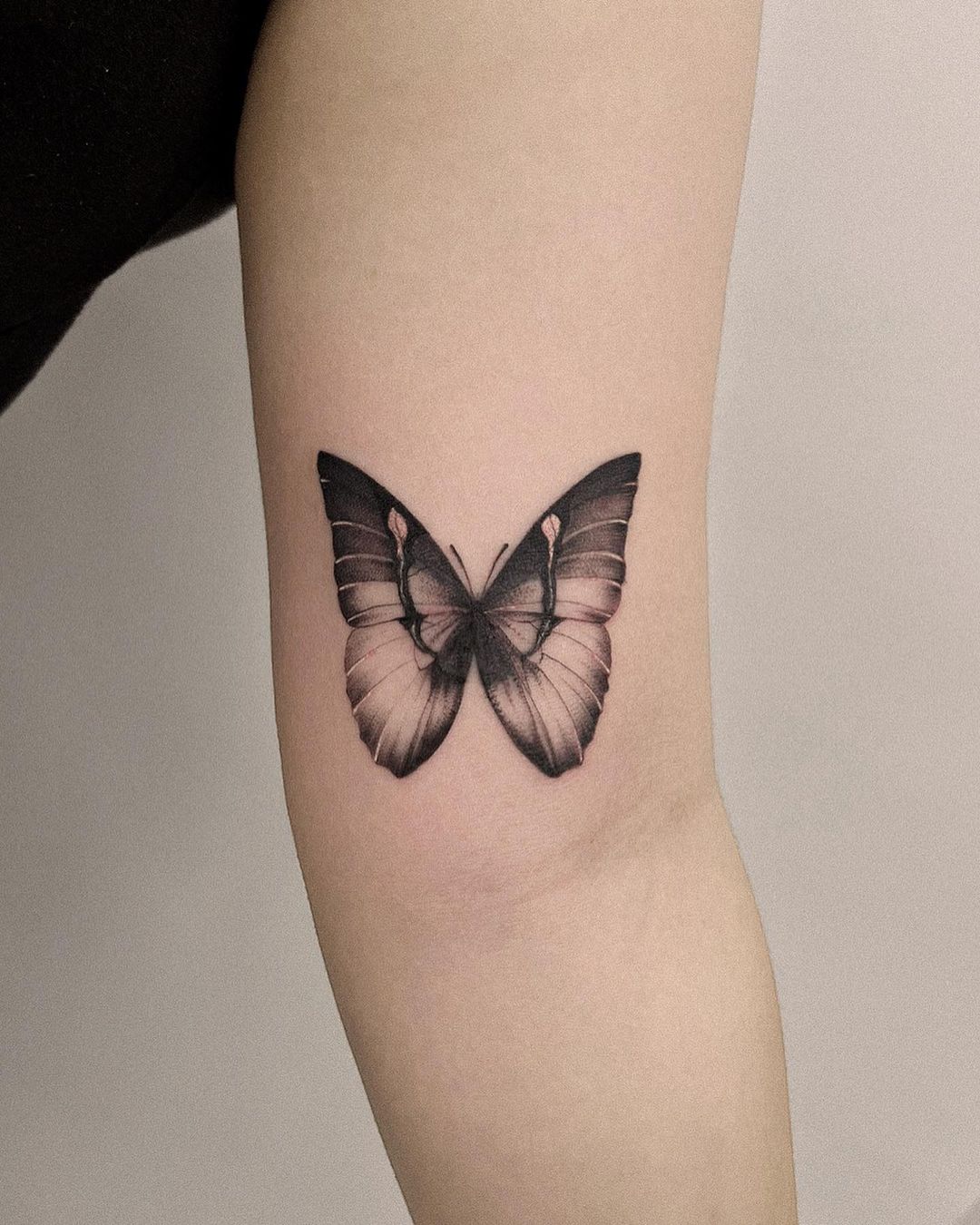 Black and Grey Butterfly Forearm Tattoo