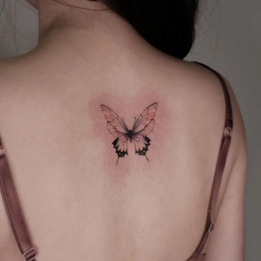 Realistic Monarch Butterfly Tattoo on Women’s Back