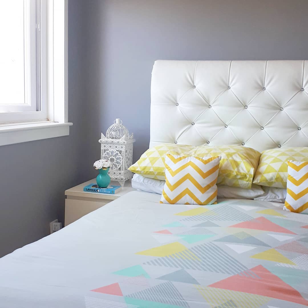 Vibrant colors like orange and pastel yellow for a cool bedroom