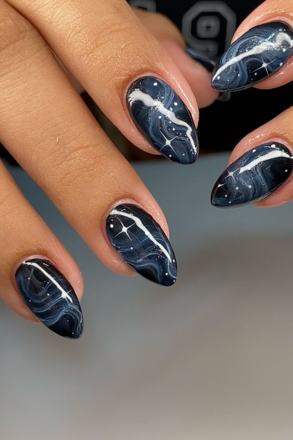 30 Black Nail Art Designs 2025: Unleash Your Style with Trendy Looks! 29 Galaxy Marble Swirls