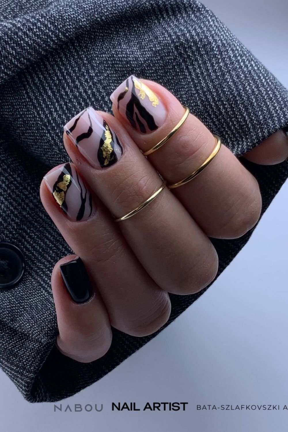 30 Black Nail Art Designs 2025: Unleash Your Style with Trendy Looks! 19 Gold Zebra Luxe
