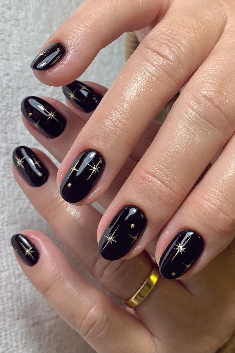 30 Black Nail Art Designs 2025: Unleash Your Style with Trendy Looks! 13 Golden Starry Night