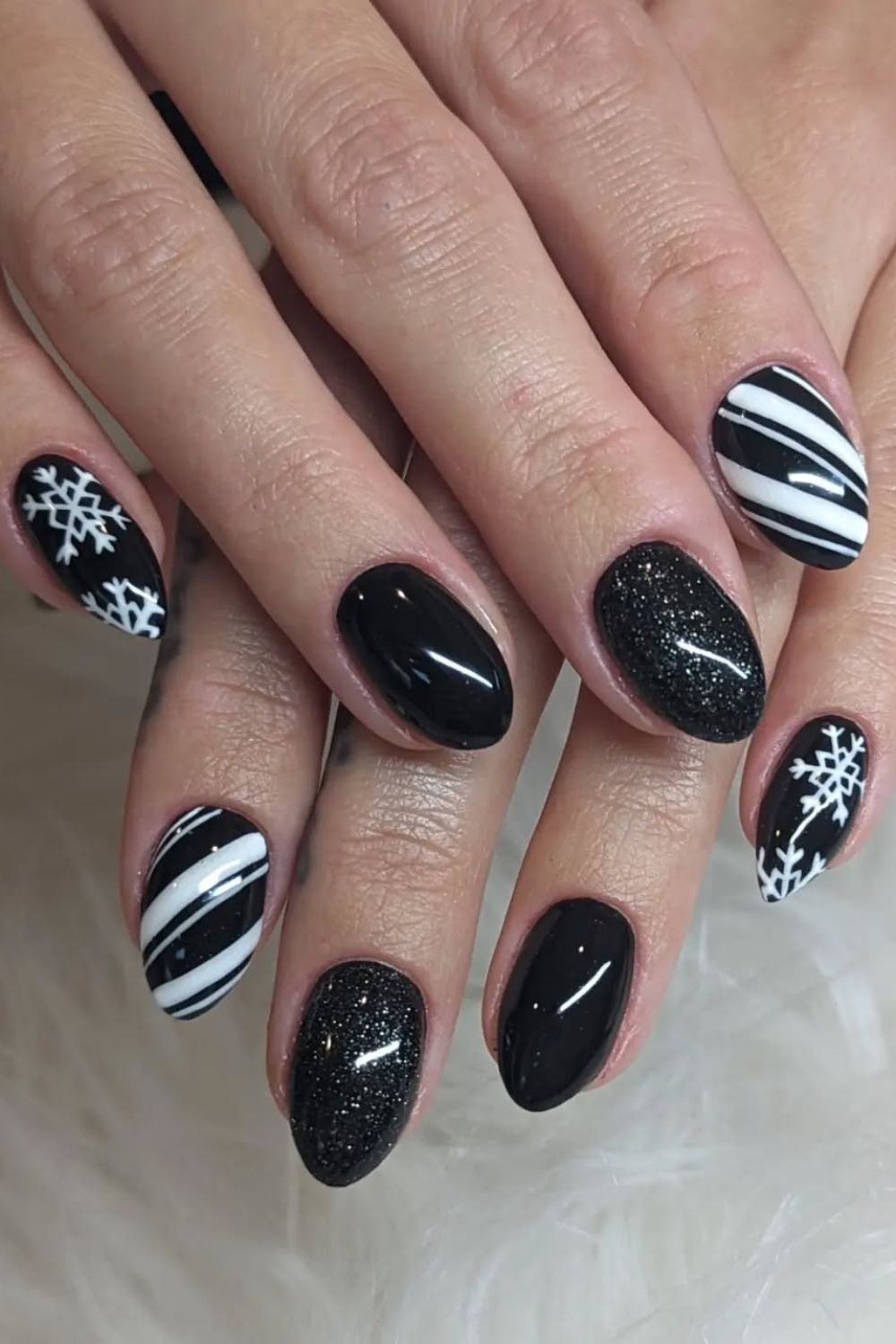 30 Black Nail Art Designs 2025: Unleash Your Style with Trendy Looks! 17 Striped Snowflakes
