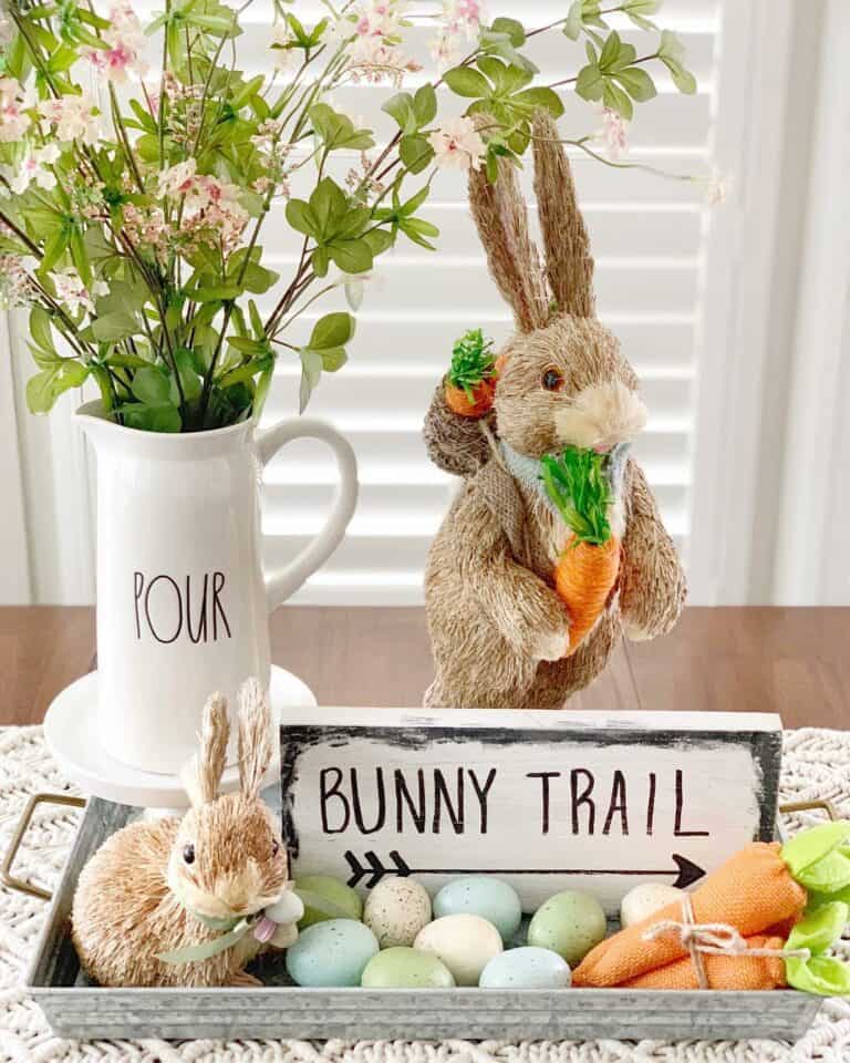 Brown Rabbit Next to Green Spring Foliage