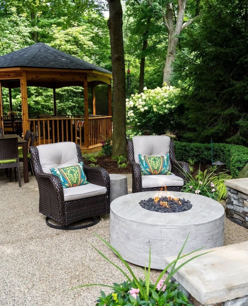 20 Modern Outdoor Fire Pit Ideas: Sleek Designs for Any Home 20 Circular Fire Pit with Built-in Storage