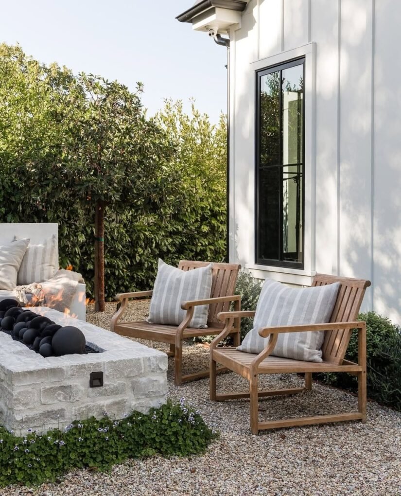 20 Modern Outdoor Fire Pit Ideas: Sleek Designs for Any Home 6 Rustic Stone Fire Pit with Log Benches
