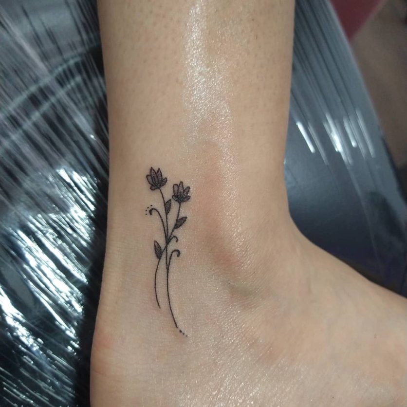 A delicate and beautiful ankle tattoo