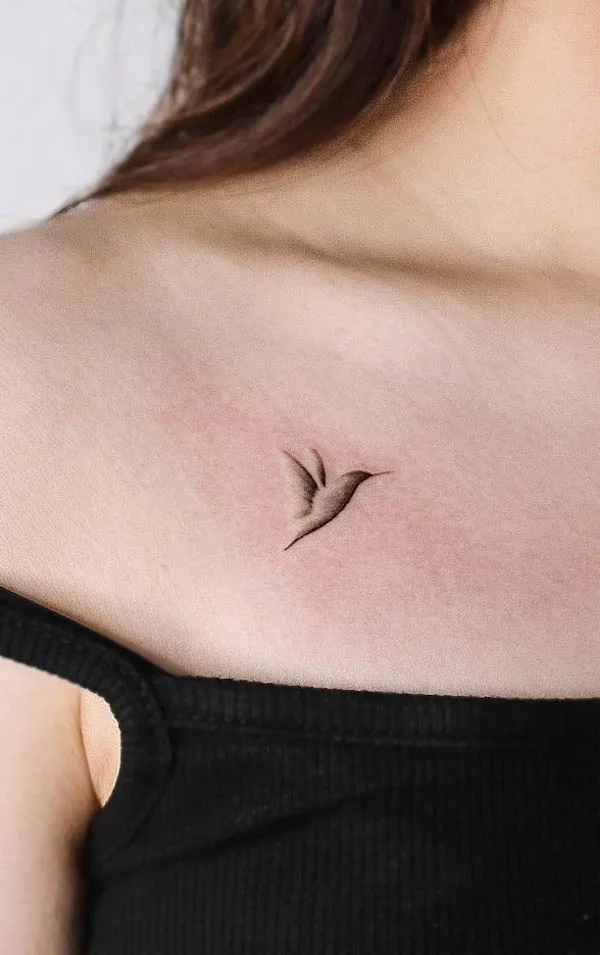 A unique embossed hummingbird tattoo