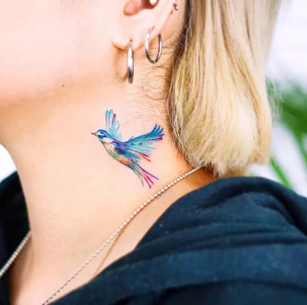 Blue bird neck tattoo