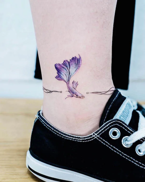 Fish anklet tattoo