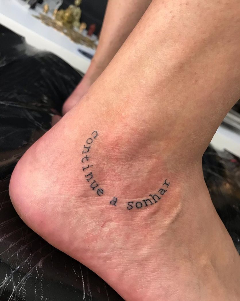 Get a phrase tattoo on your ankle