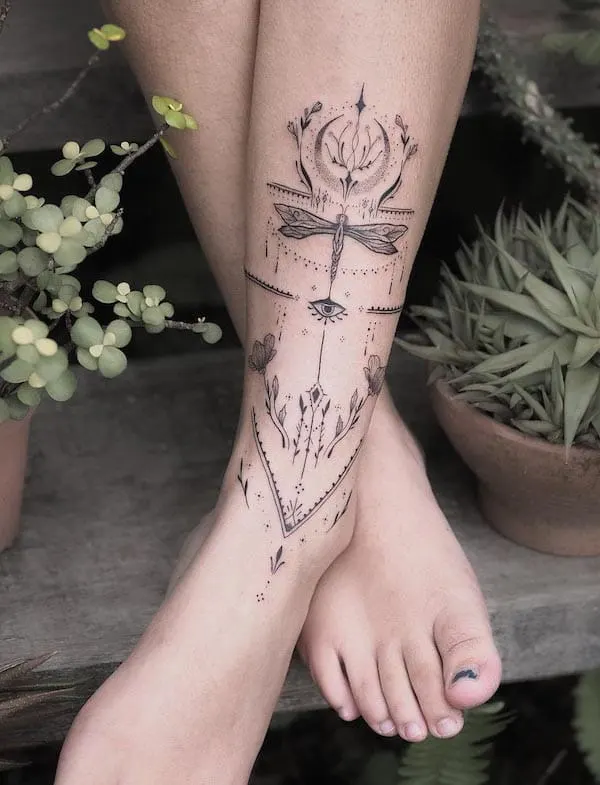 Intricate ornamental ankle tattoo