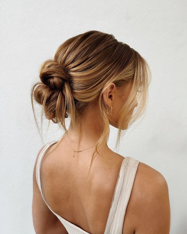 Low Bun with Face-Framing Strands