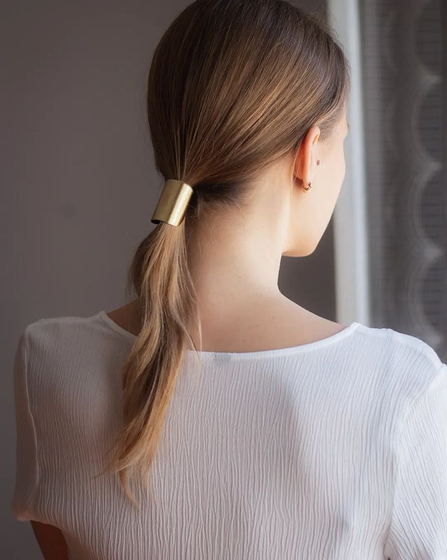 Low Ponytail With Hair Cuff Embellishments