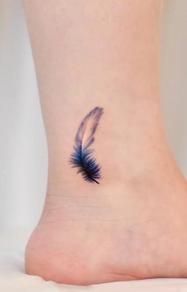 Small feather ankle tattoo