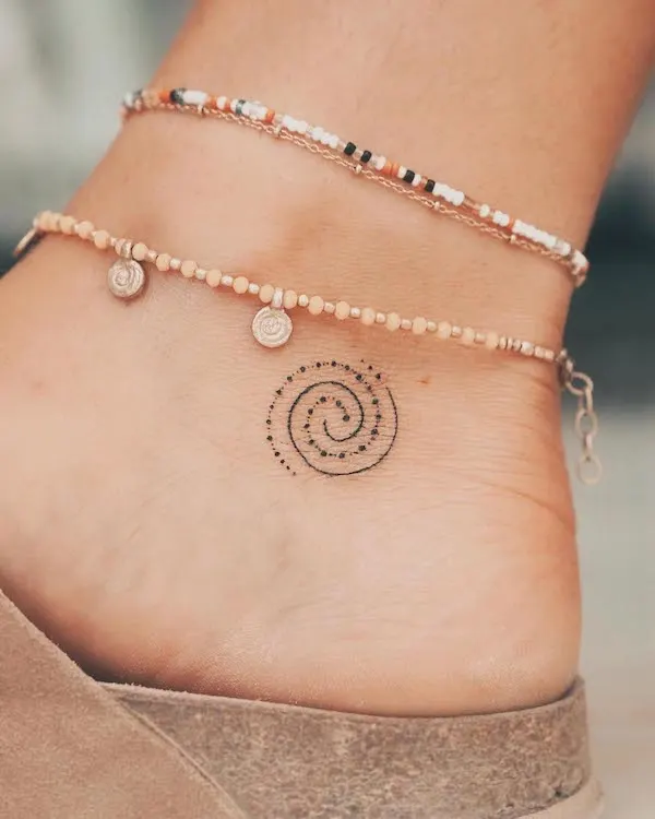 Small spiral ankle tattoo