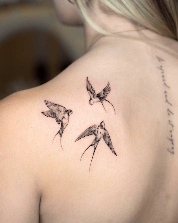 Tiny swallows on the back