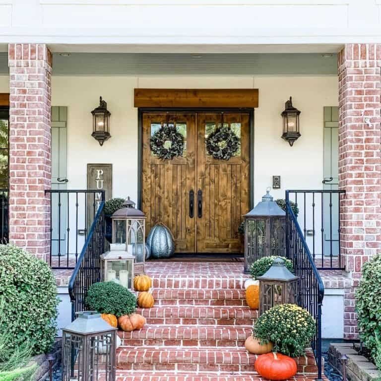 From Simple to Showstopper: 25 Easy Fall Door Decor Ideas 22 Brick Steps with Autumn Decor
