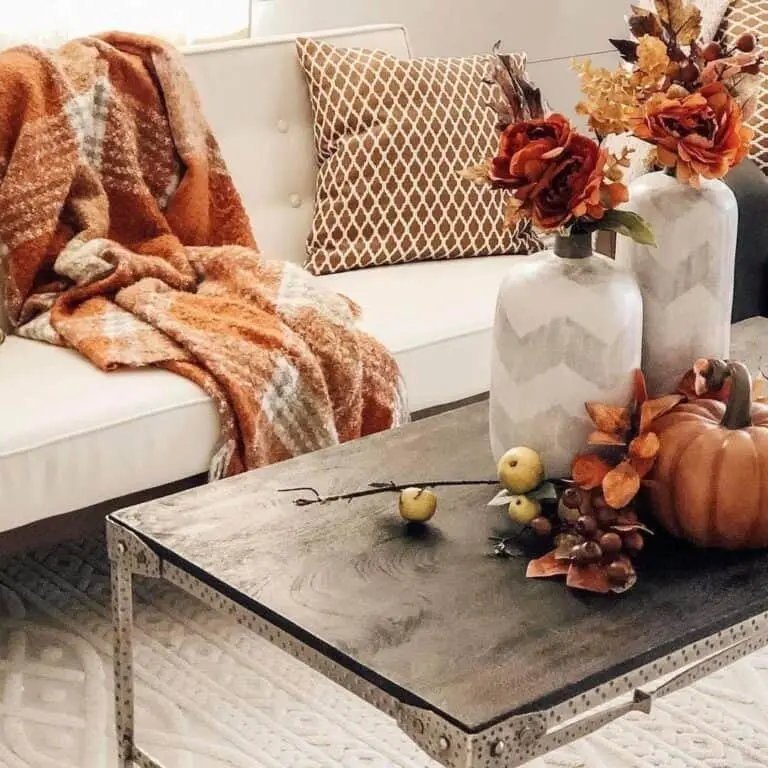 30 Fall Coffee Table Decor Ideas to Warm Up Your Home 28 Chevron Vases with Pumpkin Centerpiece