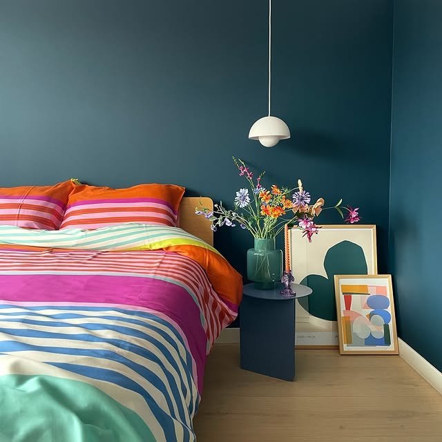 25 Colorful Bedroom Ideas That Will Brighten Your Day 18 Dark Blue Green with Colorful Beddings