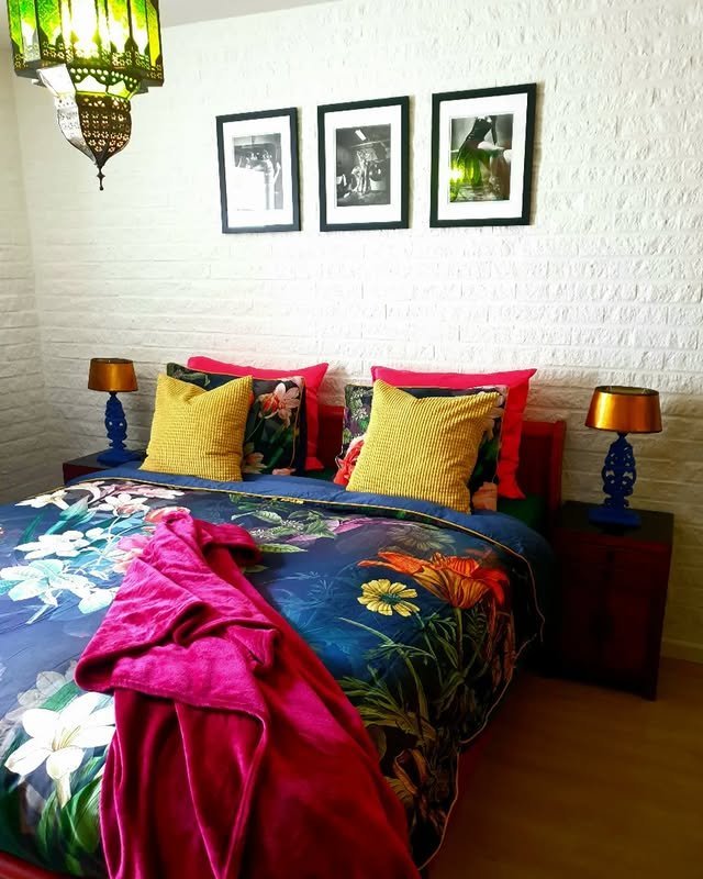 25 Colorful Bedroom Ideas That Will Brighten Your Day 8 Dark Colored Flowery Beddings