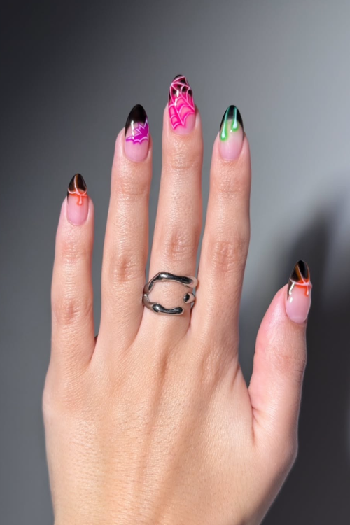 30 Halloween Nail Art Ideas 2025 for a Hauntingly Good Look 25 Electric Elegance