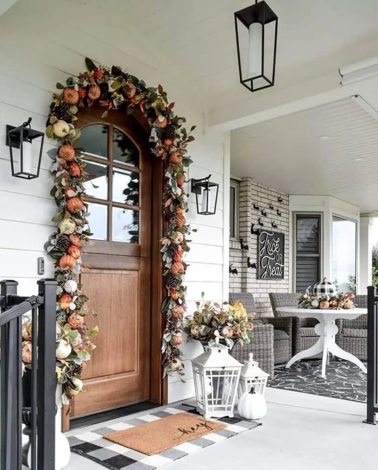 From Simple to Showstopper: 25 Easy Fall Door Decor Ideas 1 Pumpkin and Leaf Garland