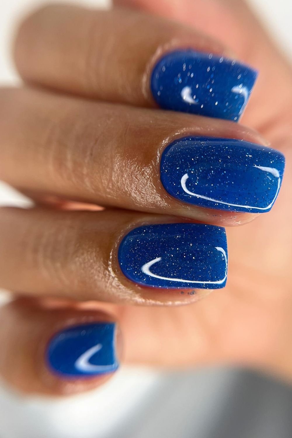 25 Stunning Royal Blue Nail Designs You’ll Want Right Now 21 Starry Short Sparkle