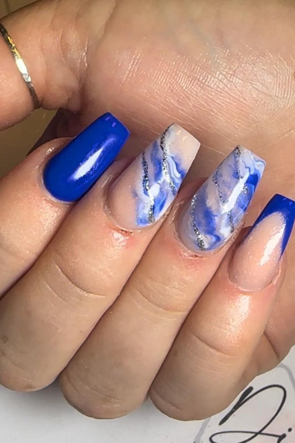 25 Stunning Royal Blue Nail Designs You’ll Want Right Now 14 Cloud Marble Swirl