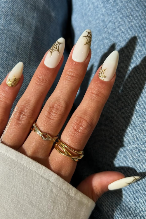 30 Halloween Nail Art Ideas 2025 for a Hauntingly Good Look 23 Webbed in Gold